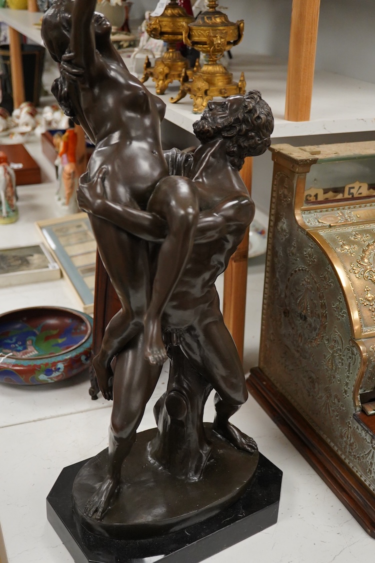 After Giambologna (1529-1608), ‘The Rape of a Sabine’, a patinated bronze raised on black marble base, 75.5cm high